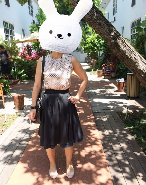 Coco-wearing-polka-dots-black-skirt