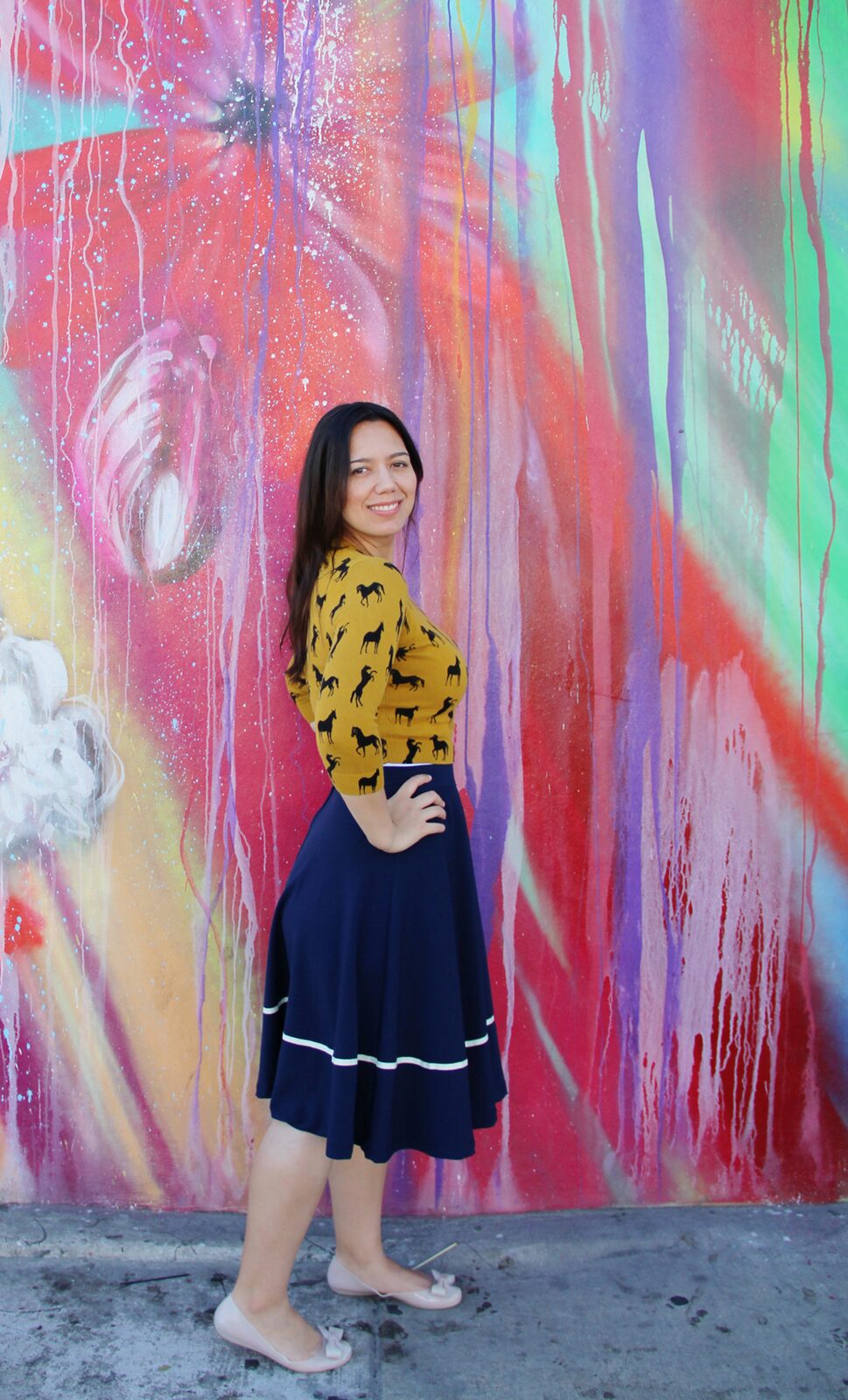 Horse all over pattern sweater in mustard with navy midi skirt and nude flats