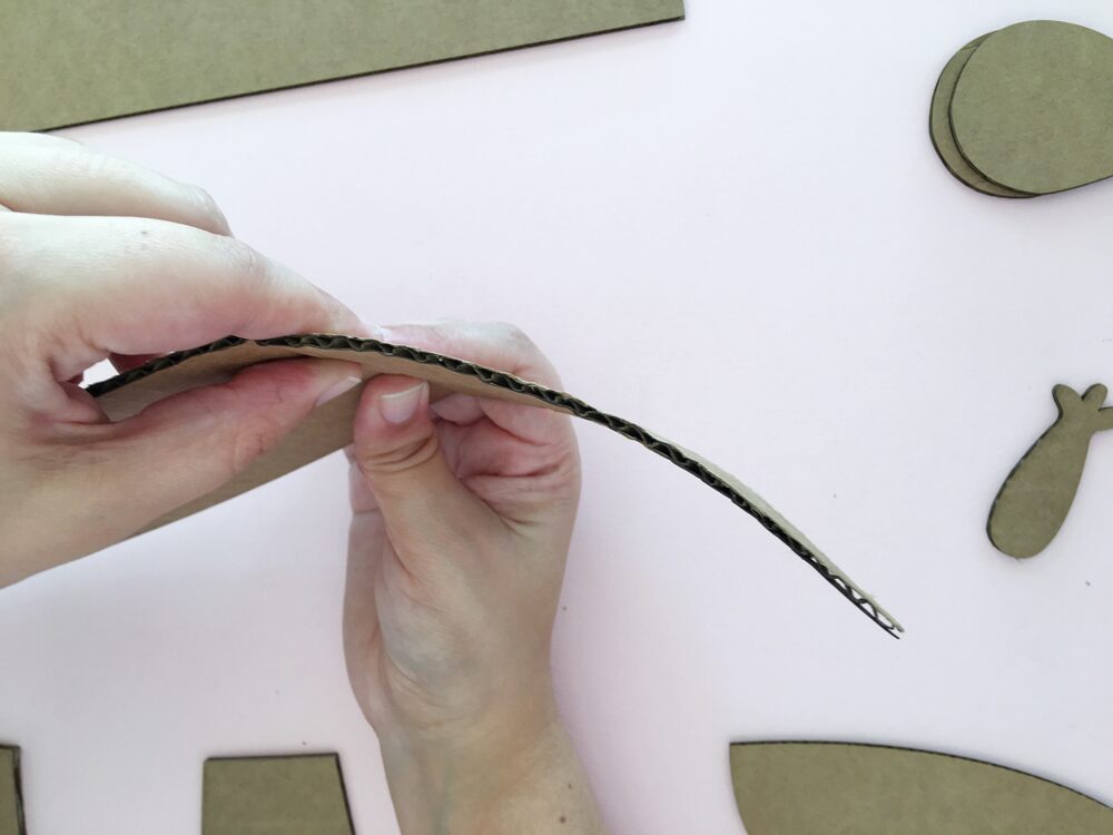 How To Make a Felt Dinosaur Bag Tutorial: Bend the belly cardboard piece