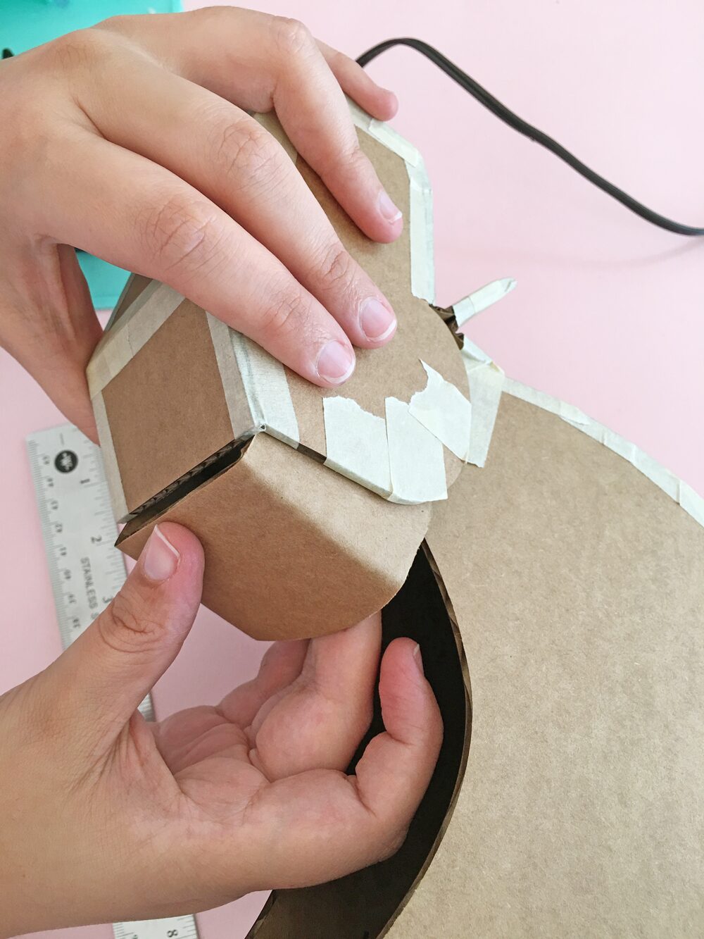 How To Make a Felt Dinosaur Bag Tutorial: Attach neck piece to head