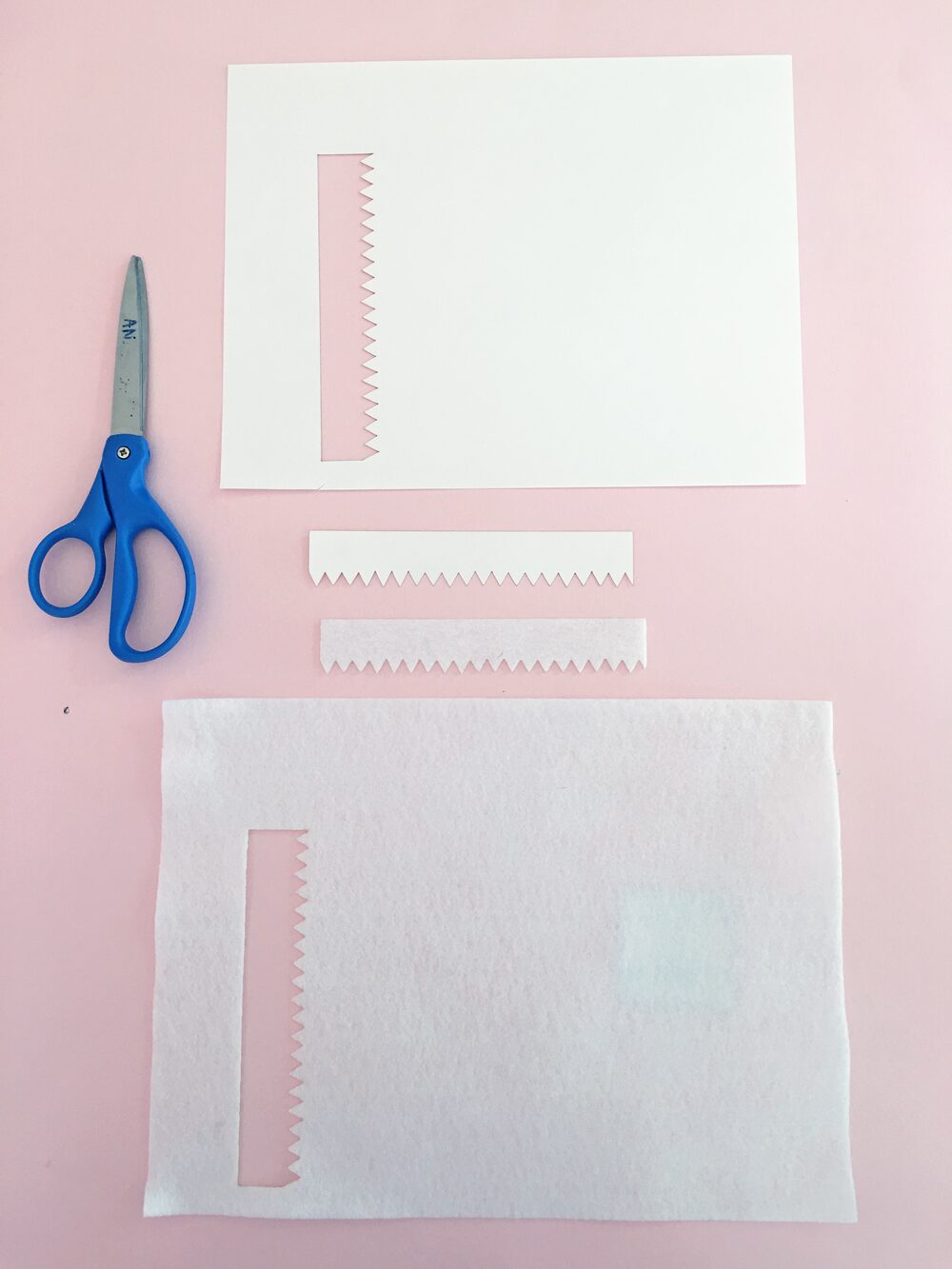 How To Make a Felt Dinosaur Bag Tutorial: Teeth cut out of white construction paper and white felt